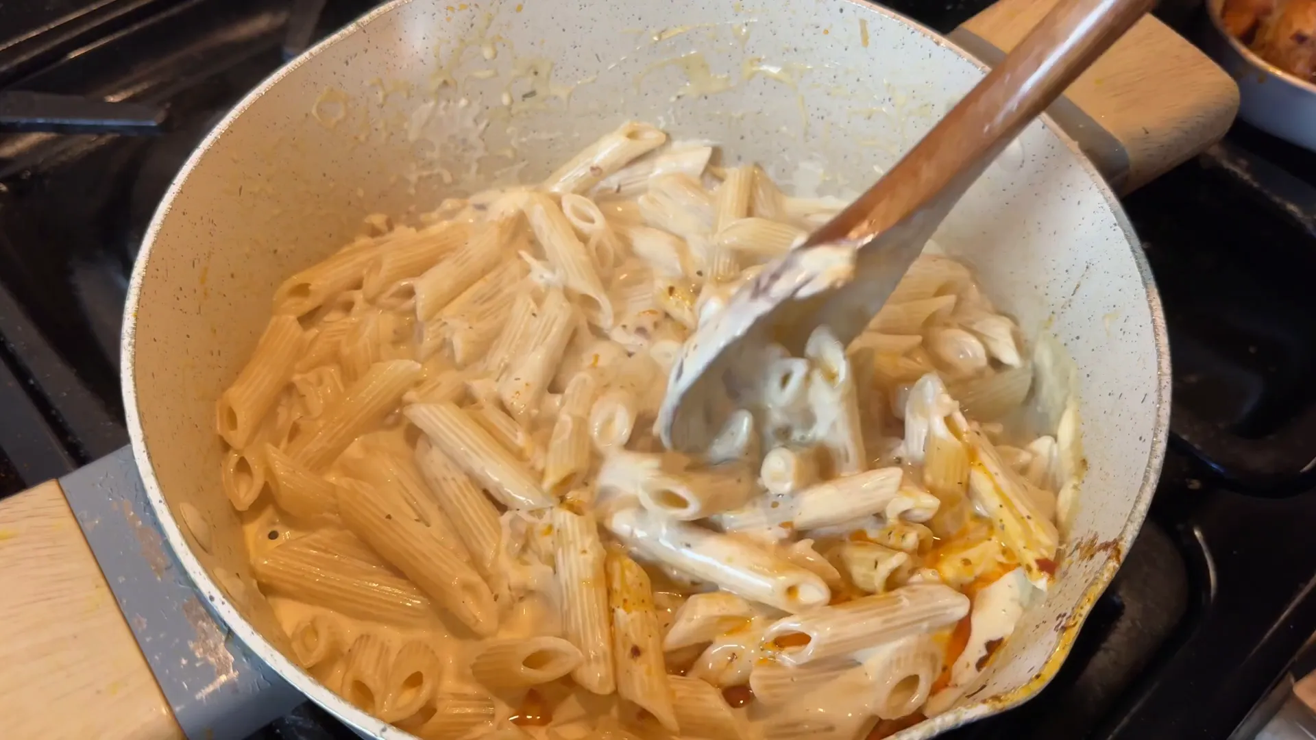 Creamy pasta sauce being prepared